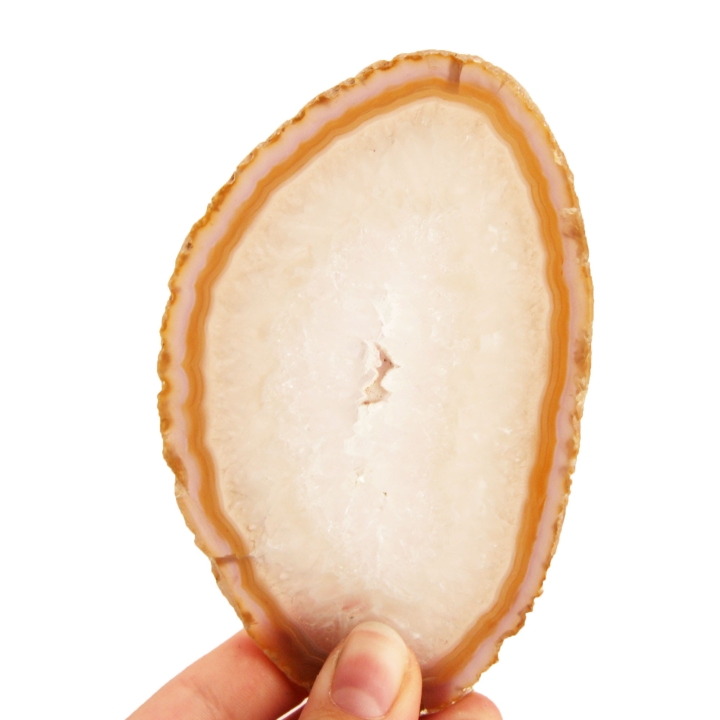 Gładki, polerowany plaster agatu w ciepłych, ziemistych kolorach.