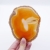 Przeświecający pomarańczowy plaster agatu, obie strony polerowane.