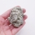 Zbliżenie na nieregularną strukturę i naturalny połysk minerału pirytu nr 018.