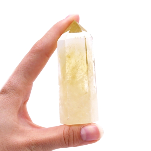 Przezroczysty obelisk cytrynowy - polerowany kwarc pochodzenia naturalnego.