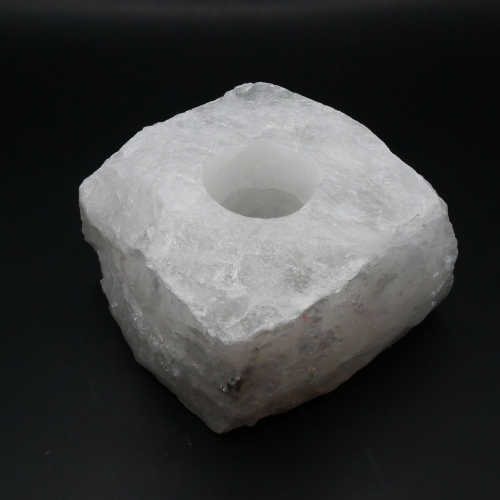 Świecznik z surowego kryształu górskiego – naturalna bryła kwarcu z miejscem na świeczkę typu tealight.